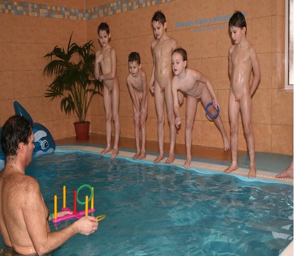 Adults and young nudists in a sauna