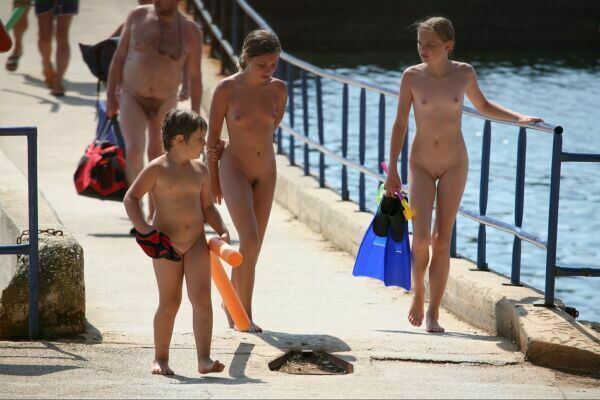 Family campaign on a nudist beach