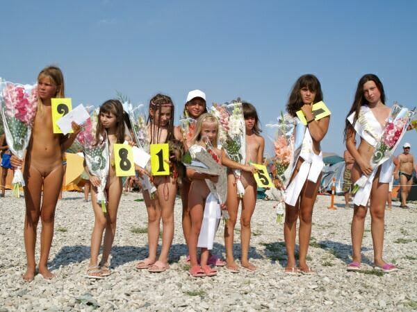 Beauty contest of very young girls of nudists