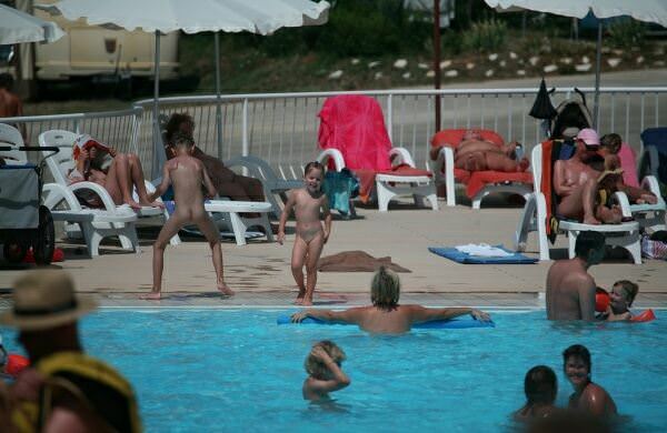 Family nudists of Europe in photo pool